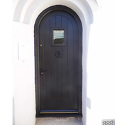 arched ebony door